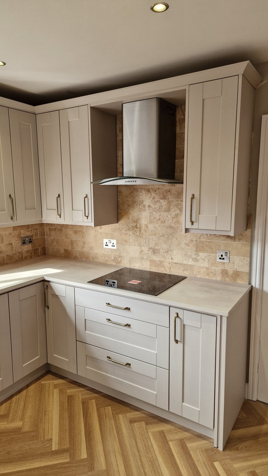 Real kitchen after revival, taupe shaker doors with brass handles